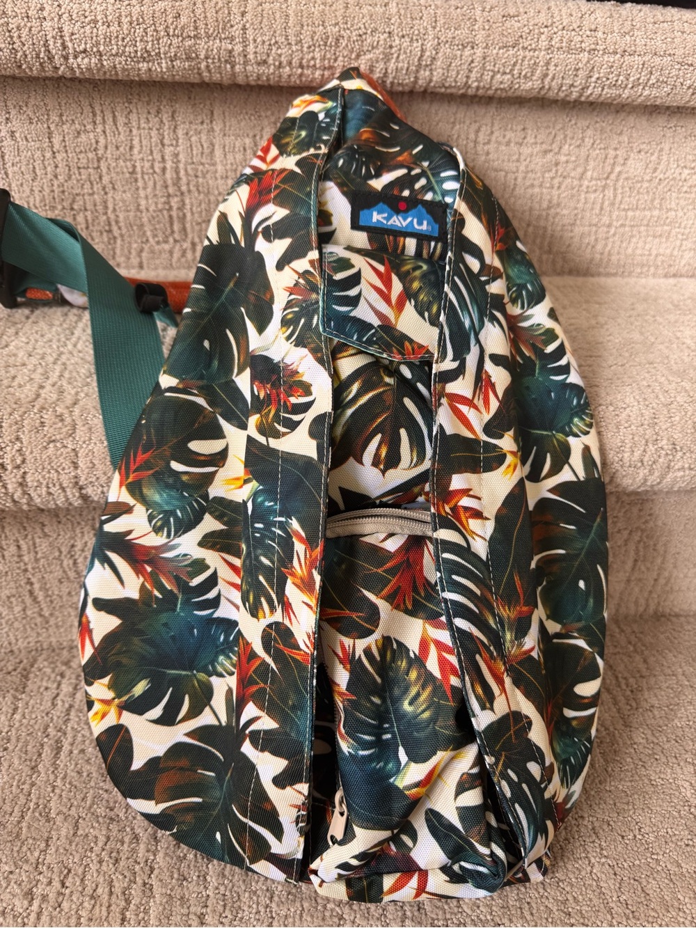 Kavu Tropical Leaf Sling Bag in Green and Cream with Teal Strap